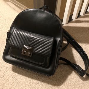 Small black leather backpack purse